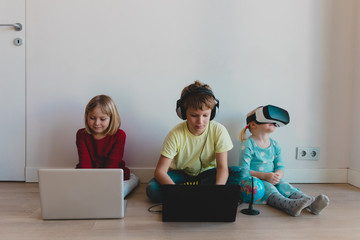 family on distant learning at home, online education for kids