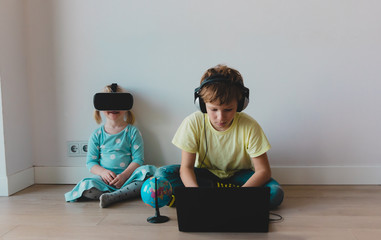 boy and girl on distant learning at home, online education for kids