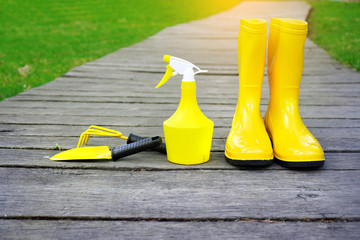 Gardening. Garden work tools on the wooden terrace.
