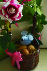 Easter basket with flowers and eggs