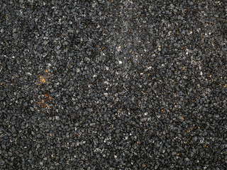 asphalt road texture background. black grit stone background