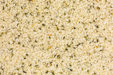 background of healthy hulled hemp seeds