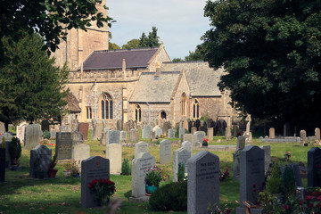 Avebury (England), UK - August 05, 2015: The church and cemetery in Avebury village, Wiltshire ,...