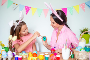 Happy easter. Beautiful little kids wearing bunny ears on Easter day.