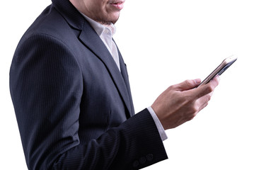 Business concept : A man in a black suit Looking at his mobile phone To read some news or messages isolated on white background