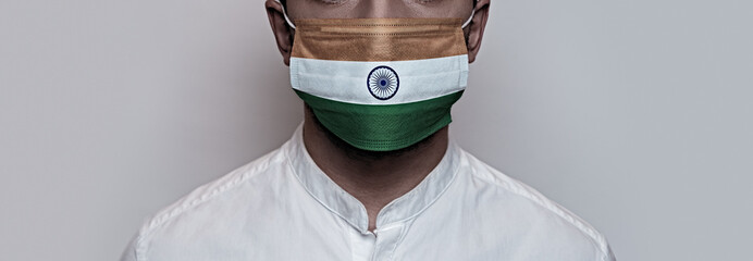 Corona virus pandemic. Concept of Corona virus quarantine, Covid-19. The male face is covered with a medical mask