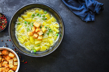 vegetable soup
green peas and small thin pasta vermicelli
Menu concept. food background. top view copy space for text
keto or paleo diet