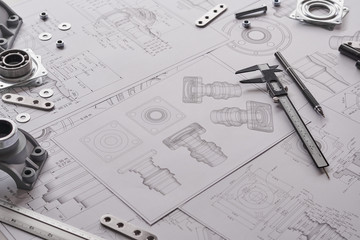 Engineer technician designing drawings mechanical parts engineering Engine.manufacturing factory...
