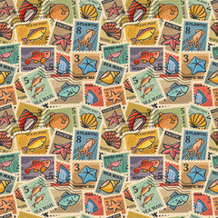 Naklejka premium seamless texture with the image of postage stamps with marine inhabitants