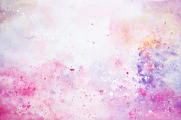 Watercolor abstract handmade background. Spray of pink golden violet and white paint.
