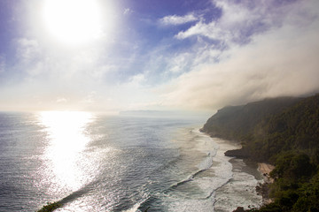 
views of the ocean and beaches in the tropics. showcasing the beauty of the waves, the reflection of the sun and trees in the coastal areas of the tropics
