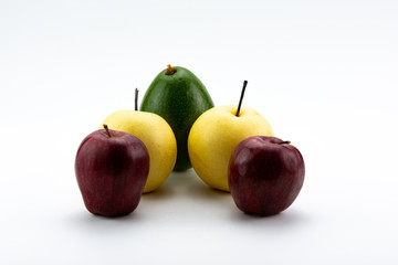 Apples, avocado, and pears on a white background.