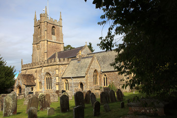 Avebury (England), UK - August 05, 2015: The church and cemetery in Avebury village, Wiltshire , England, United Kingdom.