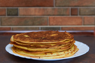 pancakes on the plate,stack of pancakes in the kitchen for breakfast