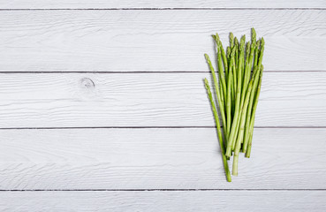 Copy space with Asparagus on a white wood background