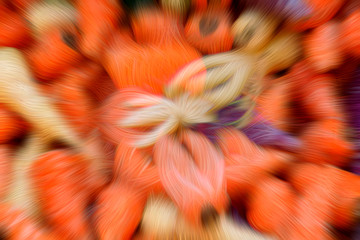 Abstract background of purple, orange and white carrots