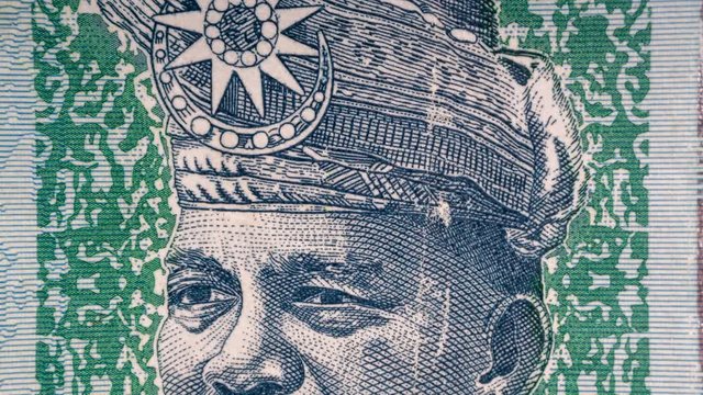 Fifty Malaysia Ringgit MYR or 50 Malaysia Ringgit Cash Banknotes macro view and Stop Motion. Concept Business Concept. Stop Motion