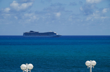 Huge modern MSC Cruises cruiseship or cruise ship liner MSC Divina at sea in summer during...