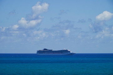 Huge modern MSC Cruises cruiseship or cruise ship liner MSC Divina at sea in summer during...