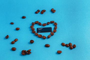 heart shaped coffee beans on a blue background in the center enter button
