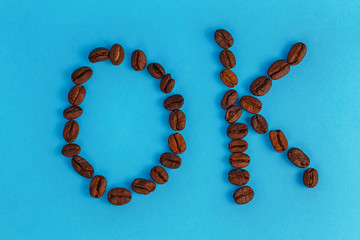 coffee beans inscription ok on a blue background