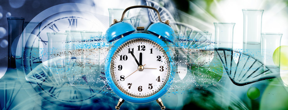  image of an alarm clock from which particles come off forming a stream