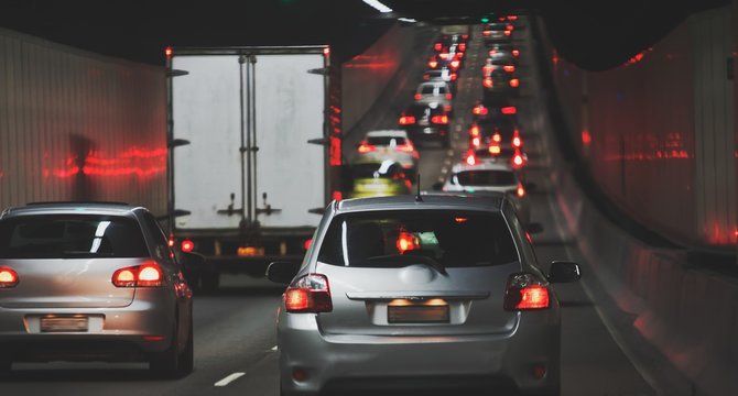Traffic jam in urban tunnel vehicles in a row