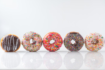 Standing Donuts White Solid Background Horizontal