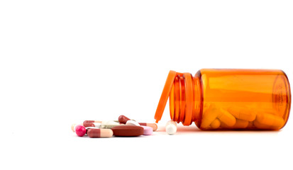 medicine bottle and pills