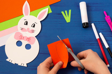Child makes toy Easter Bunny. Step 10