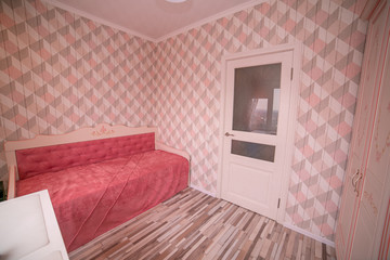 Interior for a little girl's bedroom in pink color