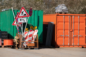 in  metal basket there are many different road signs