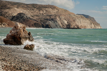 waves on the beach, high mountains