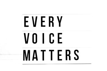 Every Voice Matters flat lay on a white background. Political Change Vintage Retro quote board