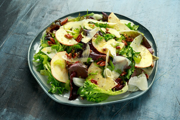 Vegetarian Fennel and apple salad with pecan nuts and Pecorino romano cheese shavings