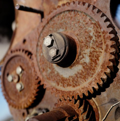 Old rusty gears - part of agricultural machinery