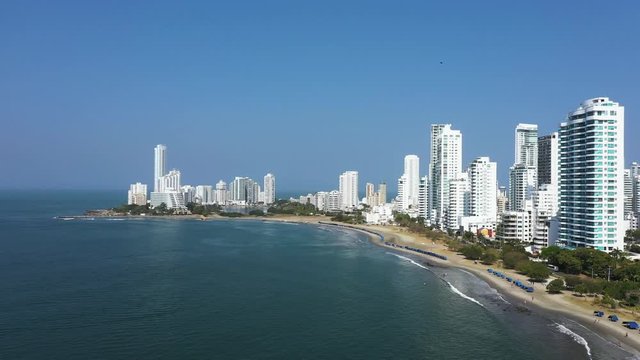 Aerial view of the Caribbean Coast in Colombia. Horizontal panning. Camera movement from bottom to top