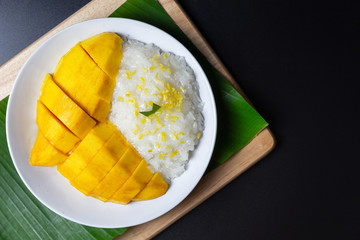 Mango with sticky rice, Thai Dessert. Fruit dessert menu,ripe mango. fresh ripe mango and sticky rice with coconut milk.