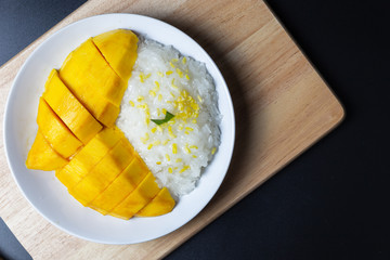 Mango with sticky rice, Thai Dessert. Fruit dessert menu,ripe mango. fresh ripe mango and sticky rice with coconut milk.