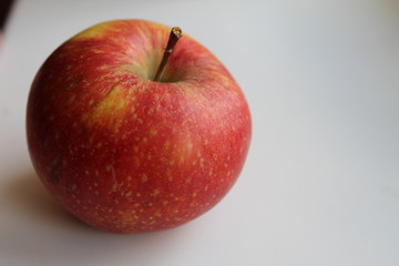 fruit red Apple close up on a white light background