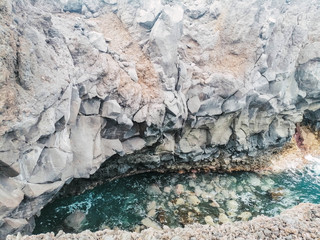Rocky mountain with natural pool, in the Canary Islands