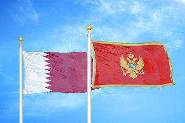 Qatar and Montenegro two flags on flagpoles and blue cloudy sky