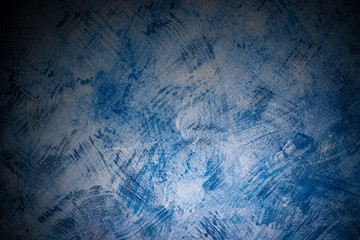 Blue paint strokes wall texture with sponge