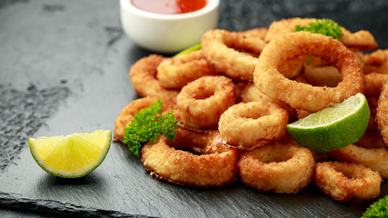 Oven baked breaded calamari rings served with lime wedges, sweet chilli sauce and mayonnaise