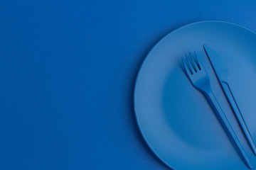 blue background with blue utensils, top view, nobody, color of the year