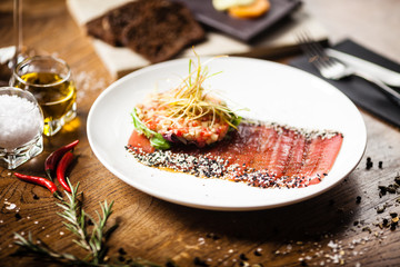 Tuna sashimi served on a plate in restaurant