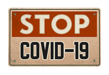 Stop COVID-19 Vintage Metal Sign with realistic rust and used effects. Retro designed sign for a restaurant or a pub. Vector illustration.