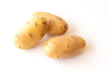 Close up potatoes isolated on white background