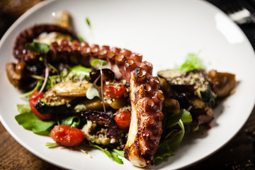 Octopus salad served on a plate in restaurant