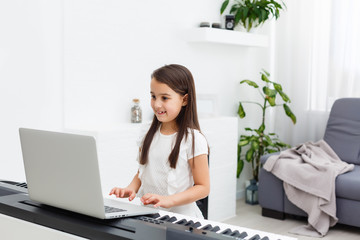 Scene of piano lessons online training or E-class learning while Coronavirus spread out or covid-19...